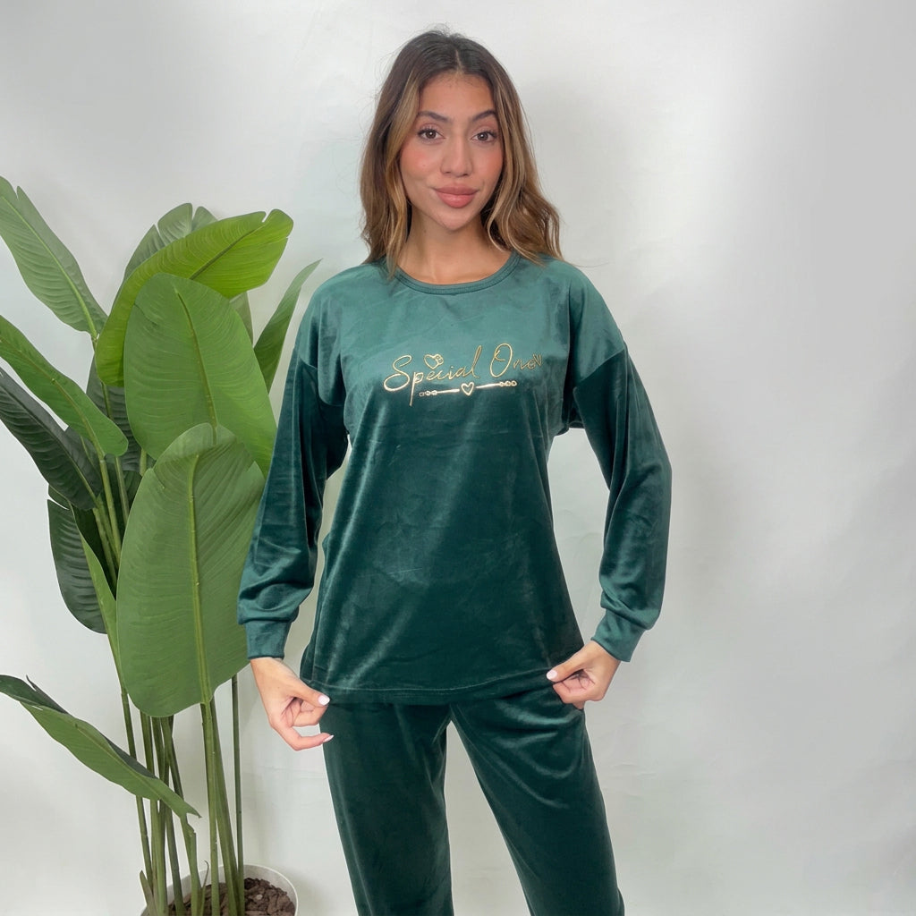 Dark green velvet pajama top with gold Special One script, worn with matching pants