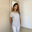 Close view of the script lettering on a heather grey pyjama top