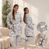 Two women in grey hooded fleece robes with cherry print, with sock close ups inset