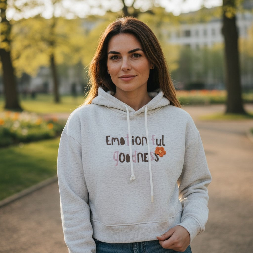 Woman in grey marl cropped hoodie with a printed slogan and flower, Jack Gifts Online Lebanon