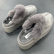 Grey suede platform slippers with soft grey fur trim, side by side