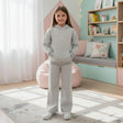 Girl in a grey fleece hoodie and matching wide leg pants