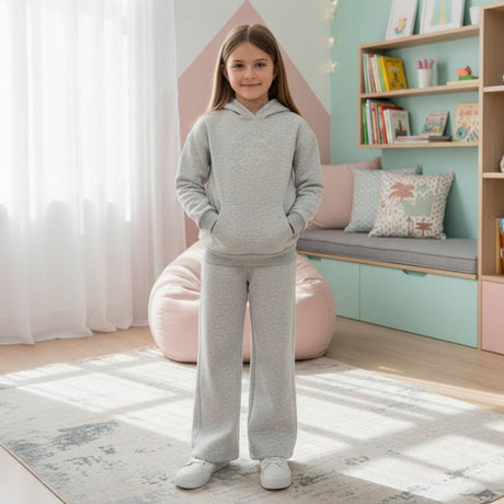 Girl in a grey fleece hoodie and matching wide leg pants