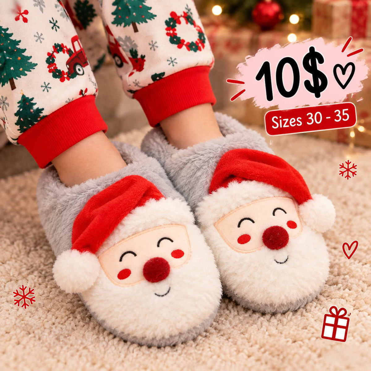 Pale grey plush kids slippers with embroidered Santa faces worn with Christmas tree print pyjamas