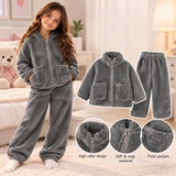 Girl in a grey sherpa fleece zip up jacket and pants, with close ups of the high collar, soft fabric and front pockets