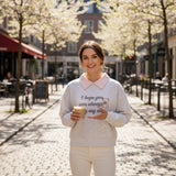 Attached pink shirt collar shown at the neckline of the grey sweatshirt