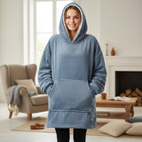 Front view of a slate grey hooded blanket worn standing with the hood up