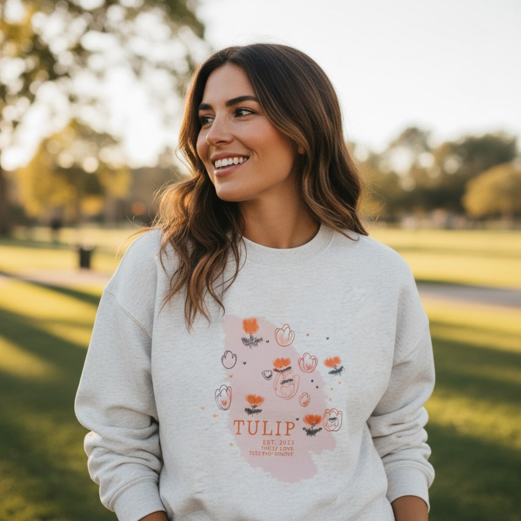 Woman in grey marl sweatshirt with a hand drawn tulip print panel, Jack Gifts Online Lebanon
