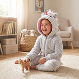 Close view of the unicorn hood with pink lining, ears, horn and pastel mane