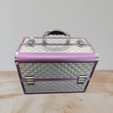 Pearl grey studded aluminium vanity case with lilac trim and a chrome arched handle
