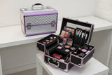 Grey studded aluminium vanity case with lilac trim beside an open case with a lid mirror