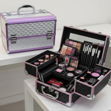 Grey studded aluminium vanity case with lilac trim beside an open case with a lid mirror
