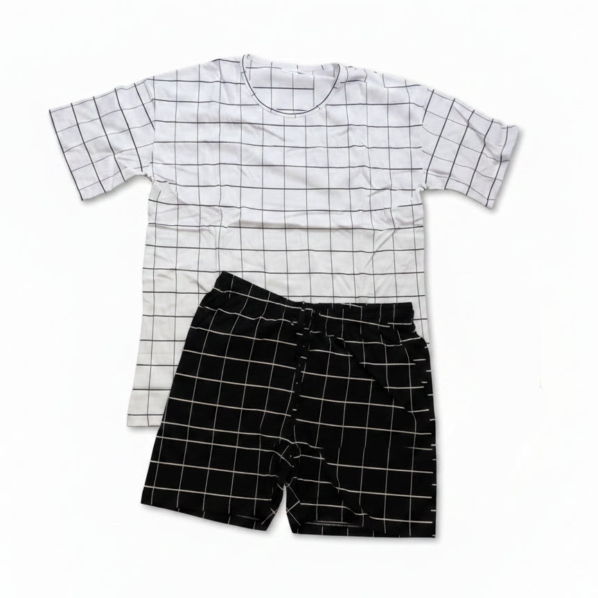 White grid print tee with black grid shorts laid flat