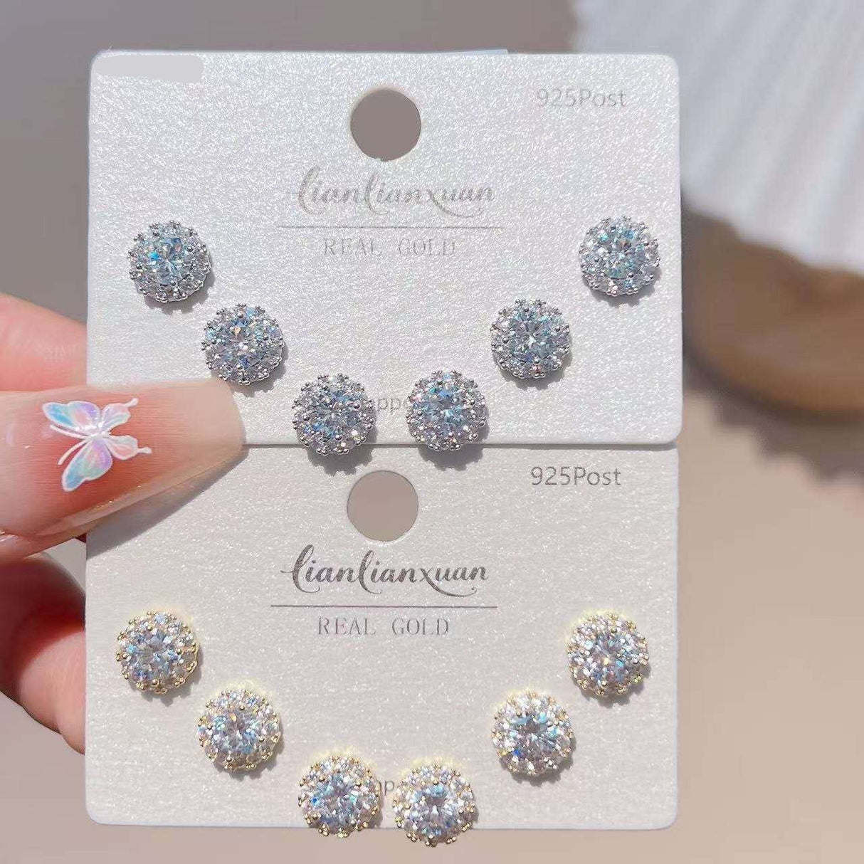 Three pairs of halo cluster crystal stud earrings, Jack Gifts Online Lebanon