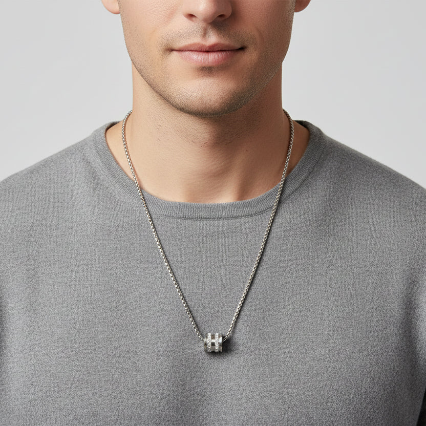 Man wearing a silver box chain with a crystal set cylinder pendant, Jack Gifts Online Lebanon