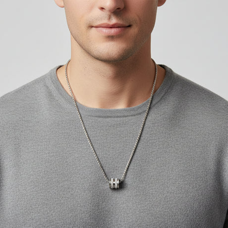 Man wearing a silver box chain with a crystal set cylinder pendant, Jack Gifts Online Lebanon
