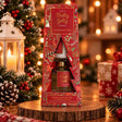 Holly Jolly cinnamon spice diffuser and candle set in a red Christmas tree window box