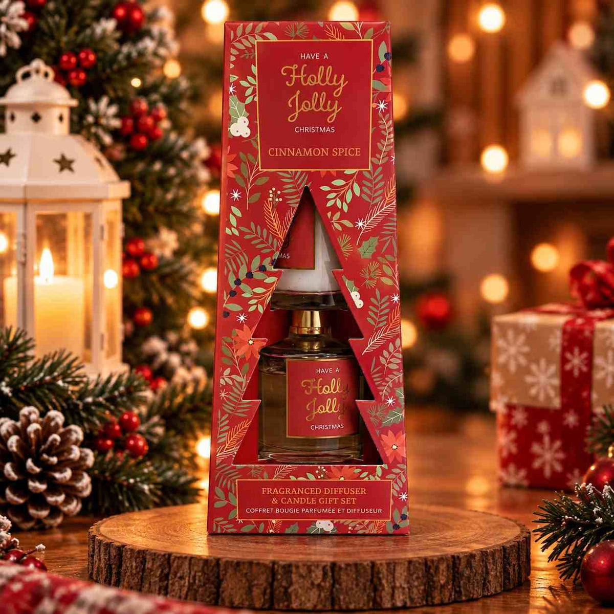 Holly Jolly cinnamon spice diffuser and candle set in a red Christmas tree window box