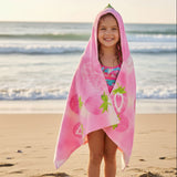 Front view of a girl in a pink strawberry hooded towel with the hood up