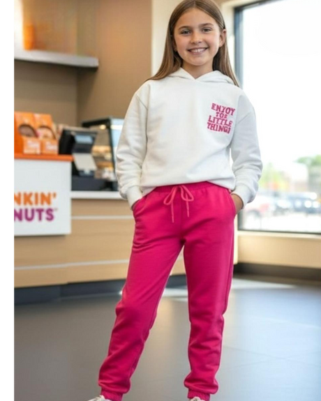 Cream oversized hoodie shown with hot pink joggers from the back
