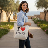 Woman carrying the I Love Lebanon canvas tote on her shoulder outdoors