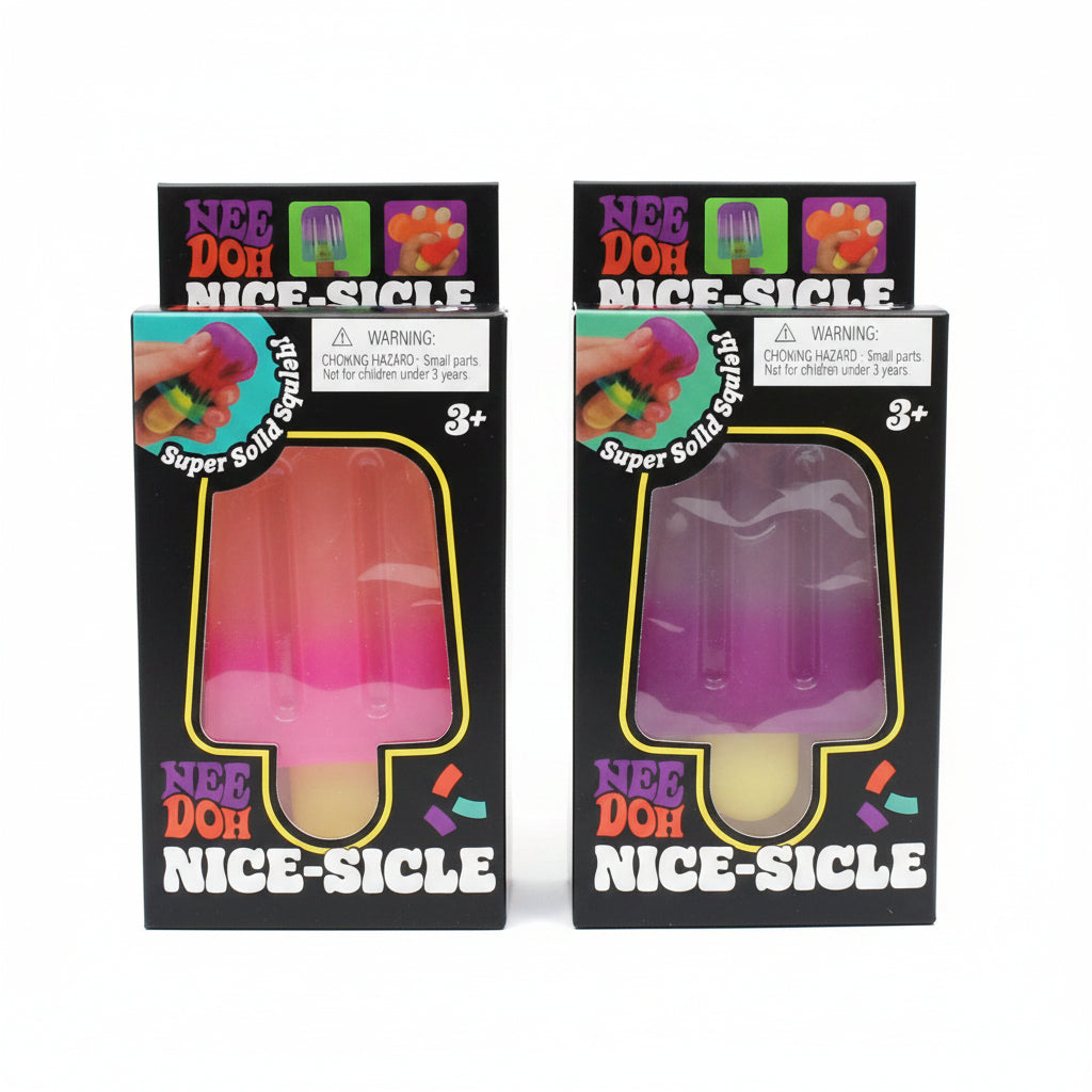 Two packages of Nice-Dog Nice-Sicle dog toys on a textured surface.