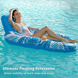 Woman relaxing on a blue inflatable pool float with leaf patterns in clear water