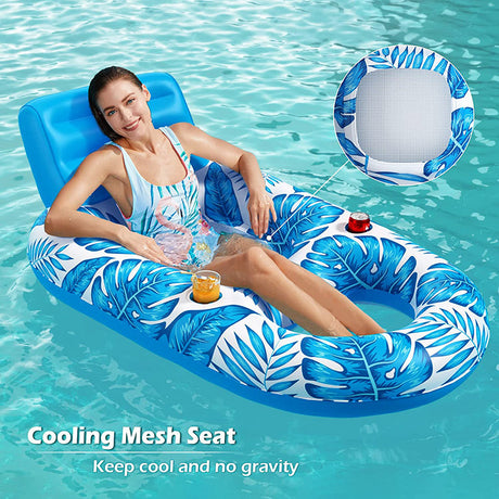 Woman lounging on a blue inflatable pool chair with leaf pattern in clear water, featuring a cooling mesh seat
