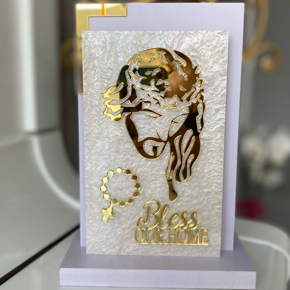 Gold profile of Christ crowned with thorns above the words Bless Our Home