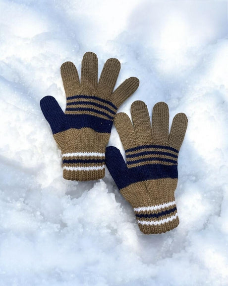 Khaki knitted kids gloves with navy and cream stripes resting on snow
