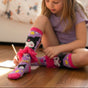 Girls purple knee high Kuromi socks with yellow stars, pink hearts and a pink tulle ankle frill
