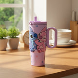 Lavender Stitch tumbler printed with Stitch and Angel hugging, on a wooden counter