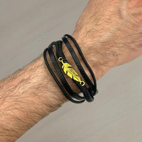 Black leather wrap bracelet with a gold feather charm, Jack Gifts Online Lebanon