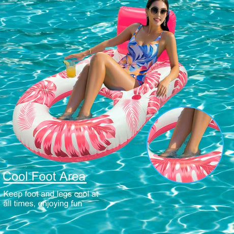 Woman lounging on a pink and white inflatable ring in a pool with a visible foot area