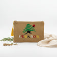 Woven jute zip pouch with a cedar tree in a red tarbouche above Lebanon in bright letters