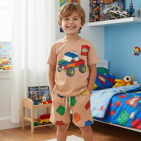 Boys set with a beige building block truck tee and matching brick print shorts, front view