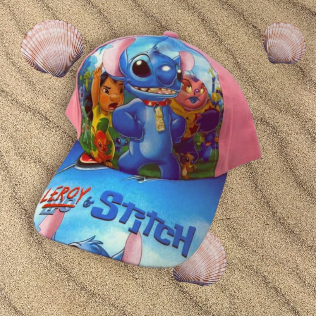 Pink and blue childrens baseball cap with cartoon alien artwork and bold peak lettering