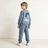 Back view of the light blue sweatshirt with inspire change print