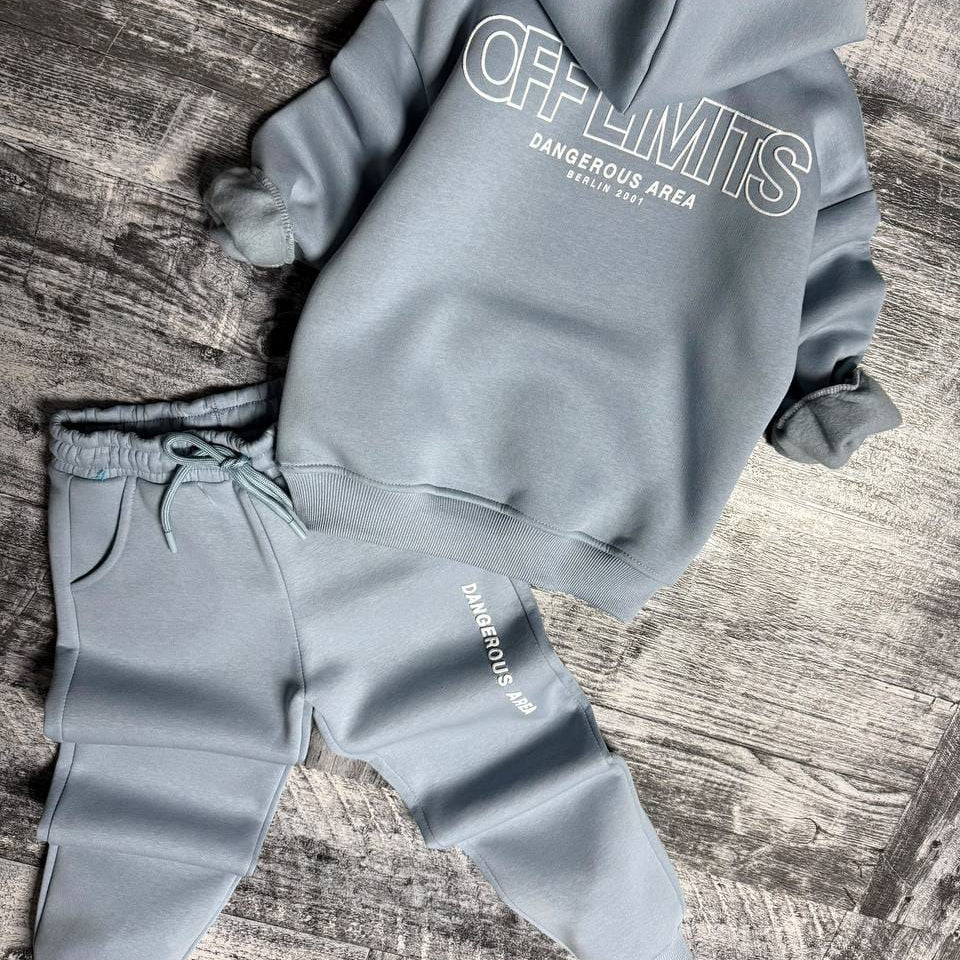 Light blue hoodie laid flat showing the large off limits outline print