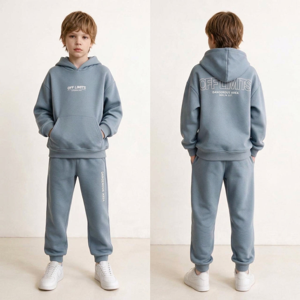 Boy shown front and back in a light blue hoodie set with off limits back print