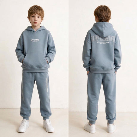 Boy shown front and back in a light blue hoodie set with off limits back print