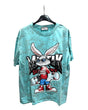 Light blue oversized tshirt with a graphic print of a stylized rabbit wearing a red shirt and holding a skateboard