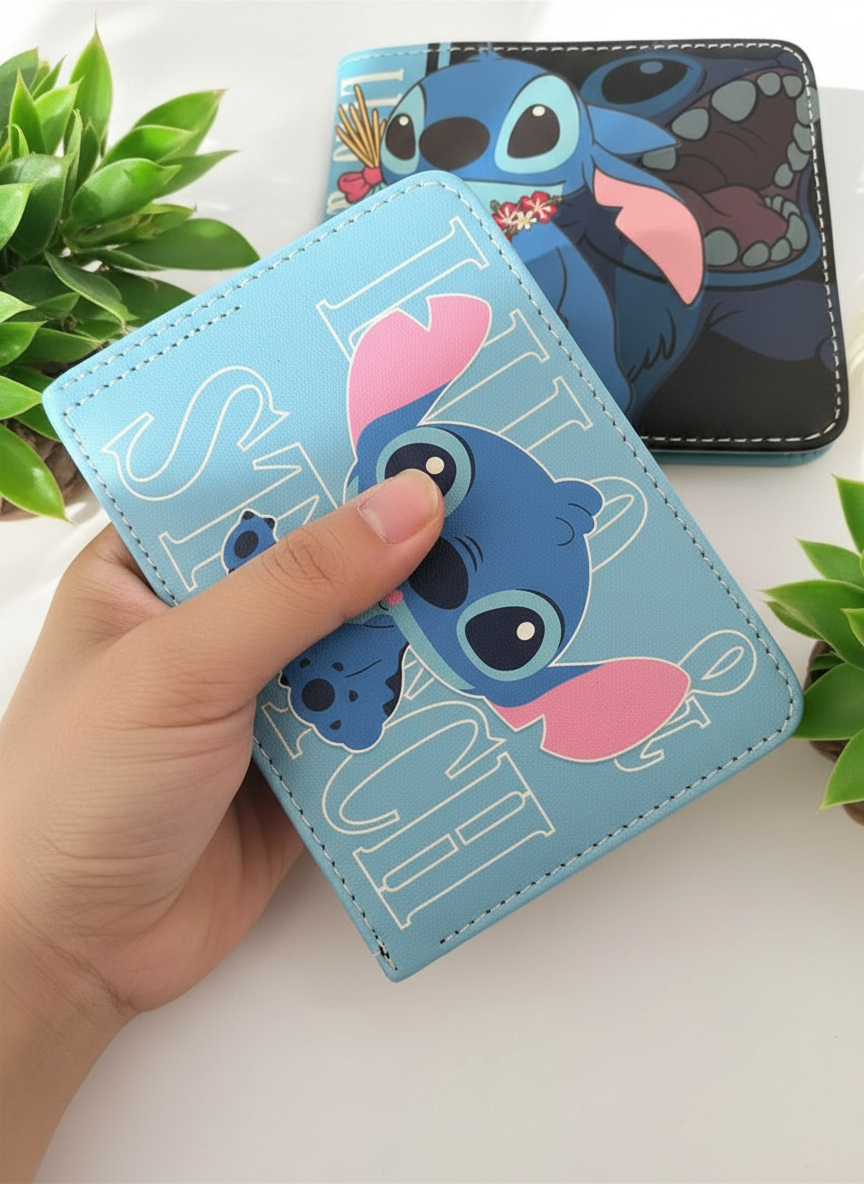 Hand holding a pale sky blue bifold wallet with a seated Stitch and outlined white lettering