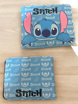 Light blue bifold wallet open flat showing an all over watermelon and Stitch face pattern