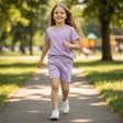 Girl walking in plain lilac tee and matching shorts set, Jack Gifts Online Lebanon