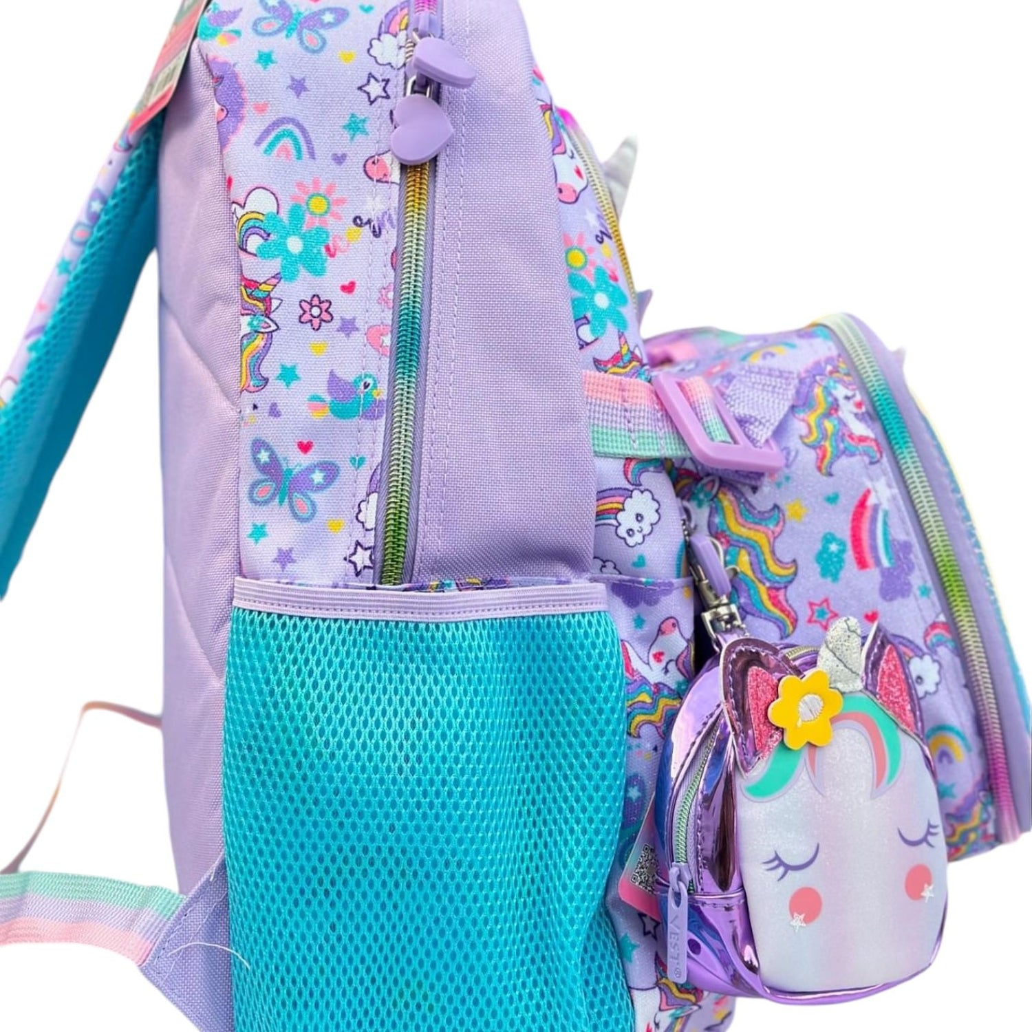 Lunch bag and unicorn pouch attached to the side of the backpack