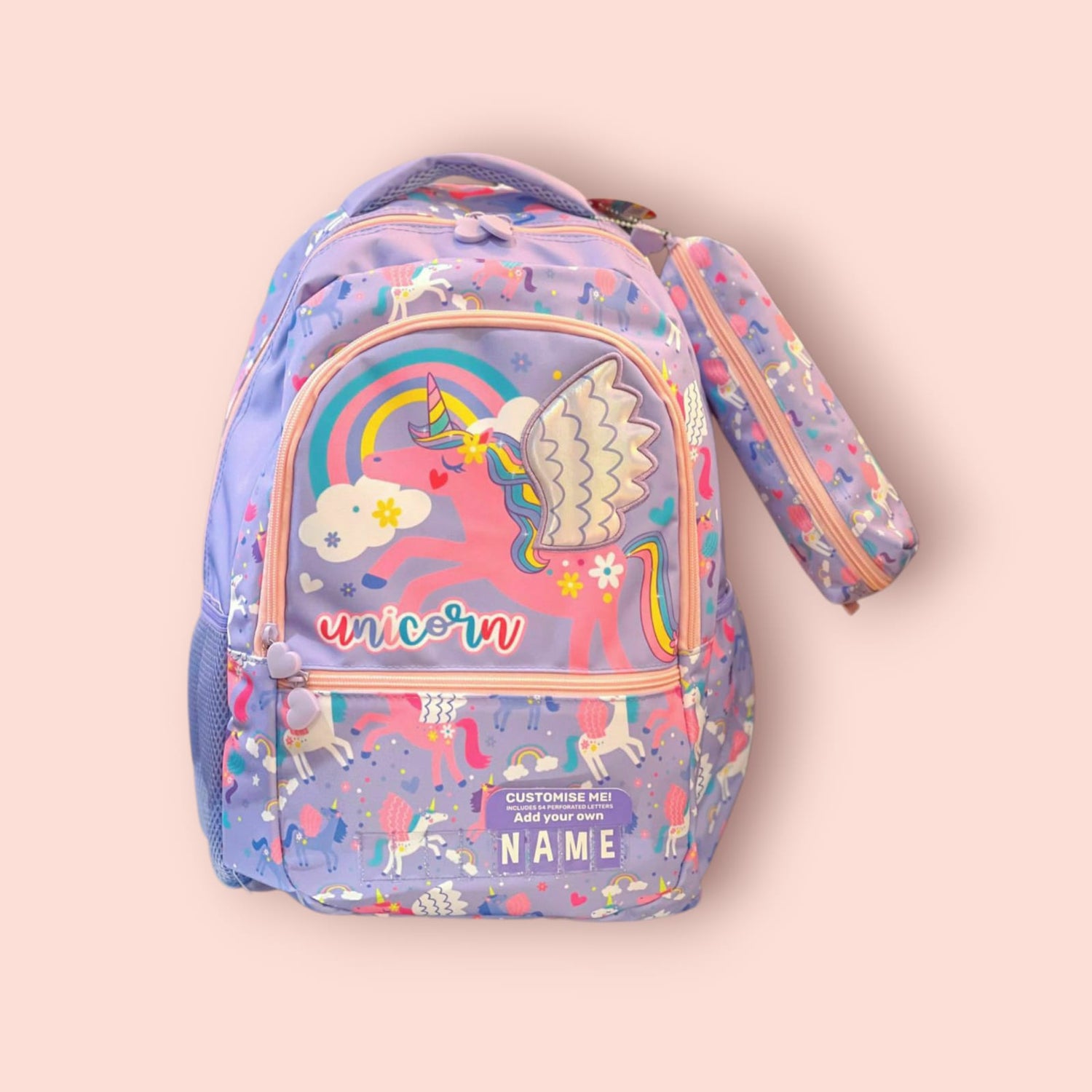 Purple unicorn print school bag with heart zip pulls and customisable name panel