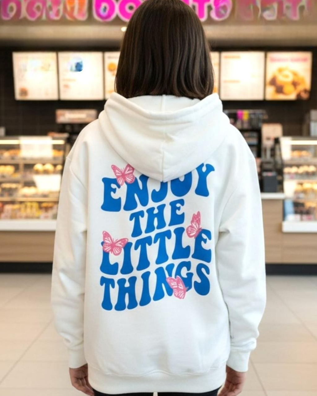 Cream hoodie with an Enjoy The Little Things butterfly back print