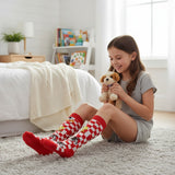 Girl seated wearing red checkered knee high socks showing Tweety and Sylvester prints