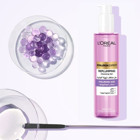 Replumping cleansing gel beside a dish of hyaluronic acid spheres and gel texture